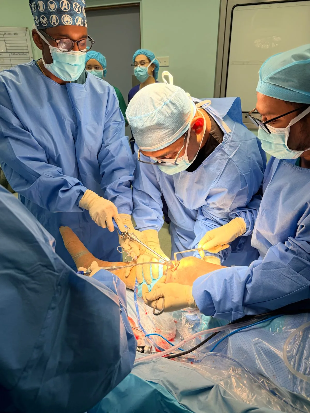 Dr. Sashi Darshan and surgical team in the operating theatre